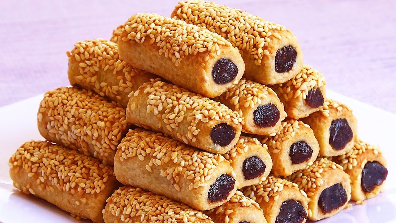 أصابع التمر بالسمسم