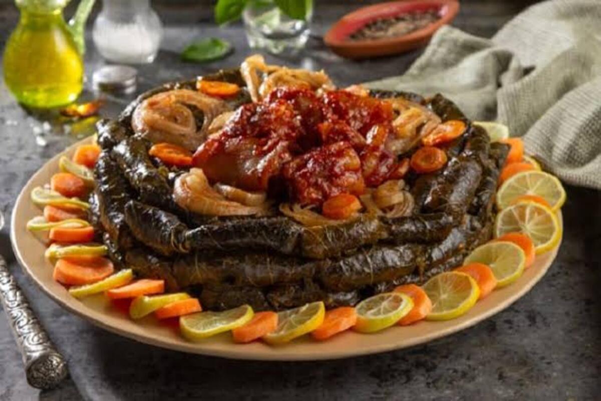 خطوات عمل طاجن ورق العنب بالكوارع