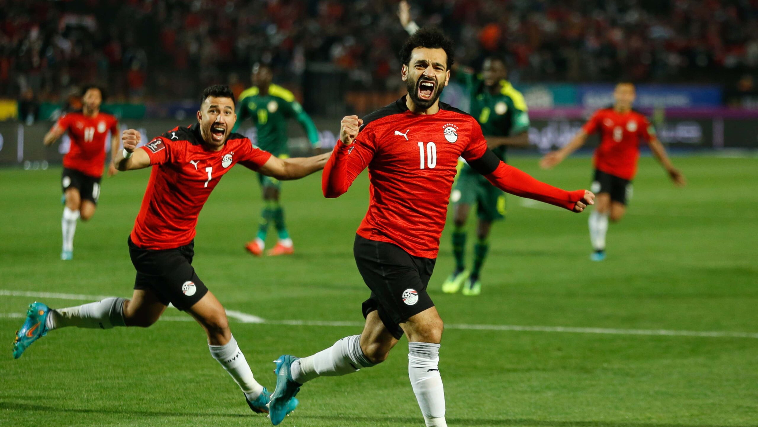 Mohamed Salah Trezeguet of Egypt celebrate vs Senegal scaled
