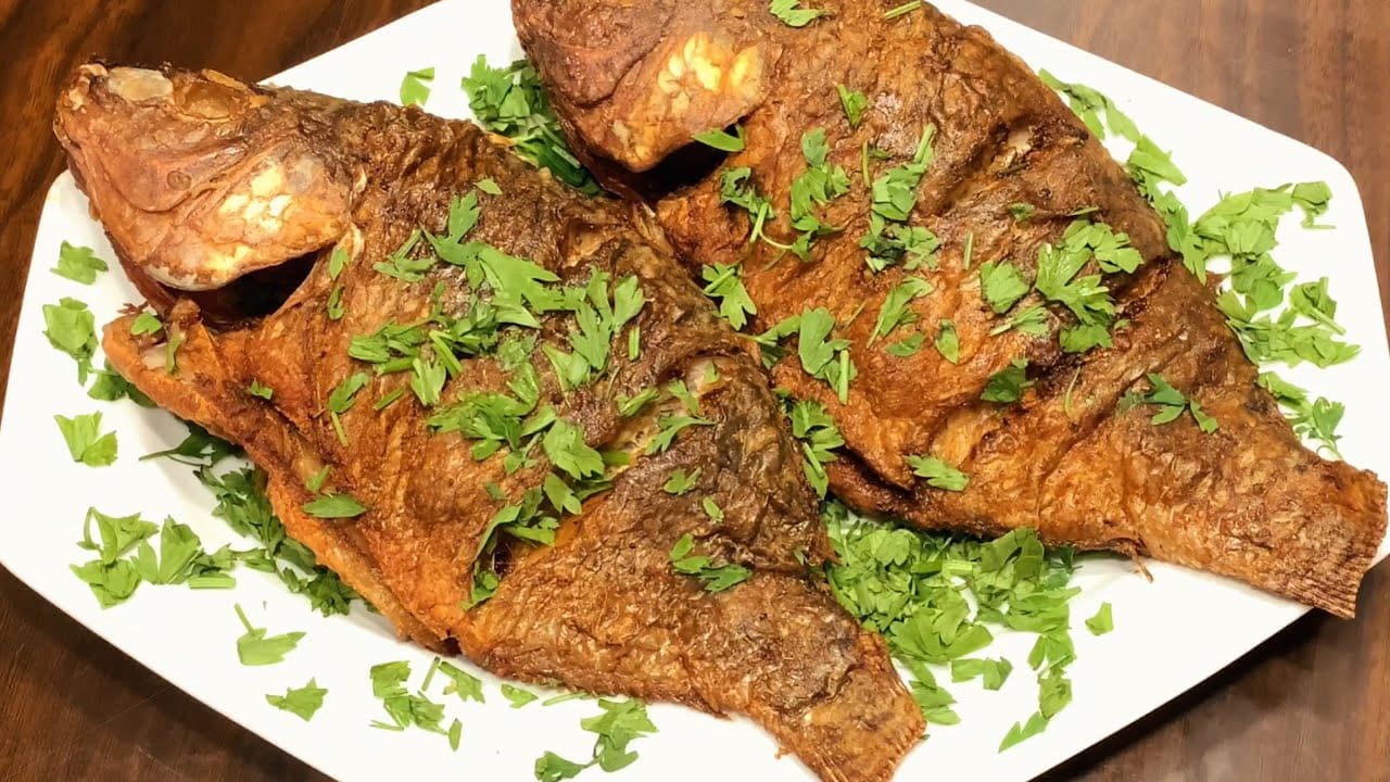 طريقة عمل تتبيلة السمك وقليه