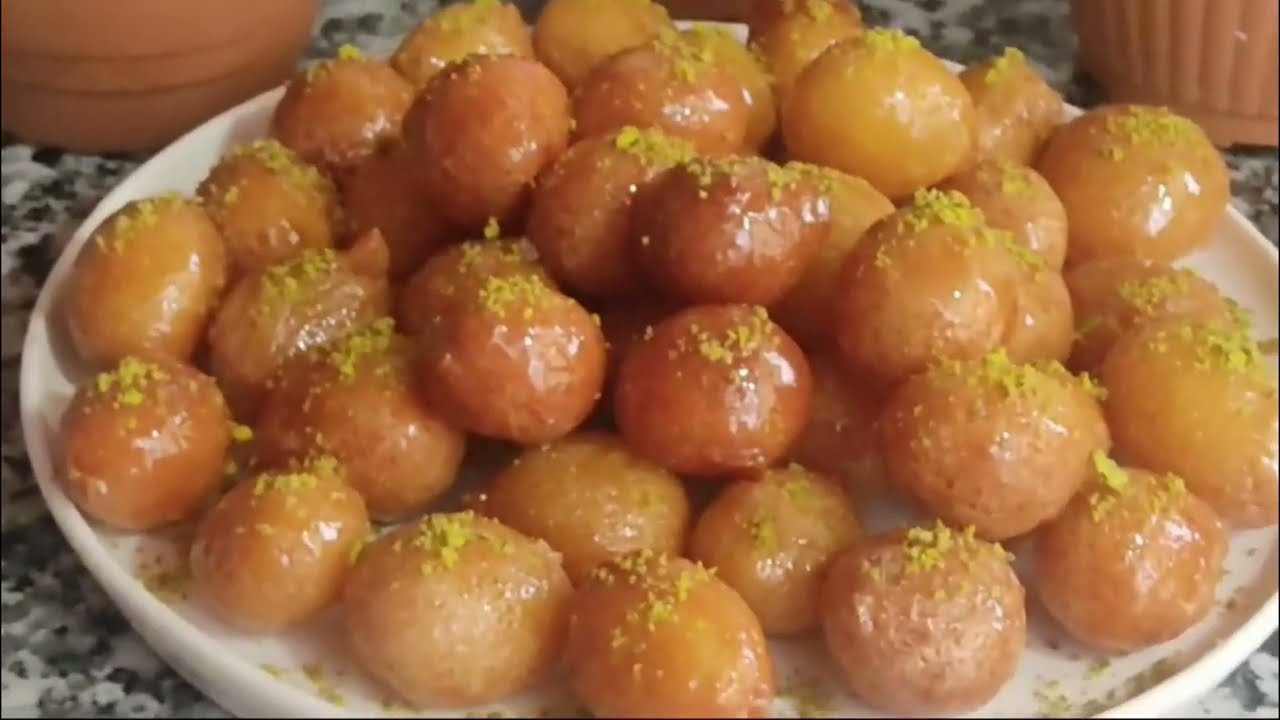 طريقة عمل حلوى العوامة اللذيذة مقرمشة من برة وطرية من جوه أحلى من الجاهزة